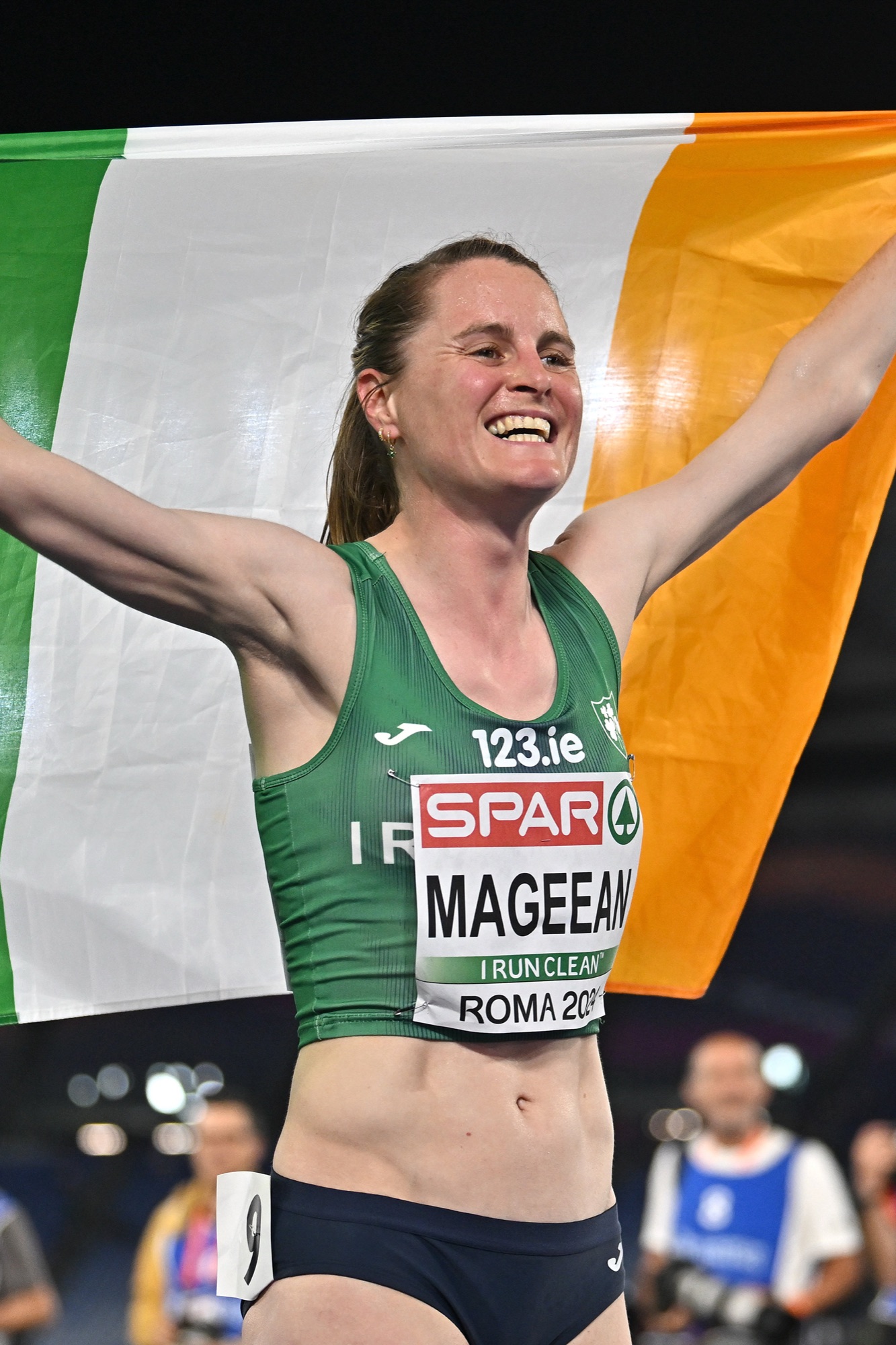 Ciara Mageean celebrating with the Irish tricolour